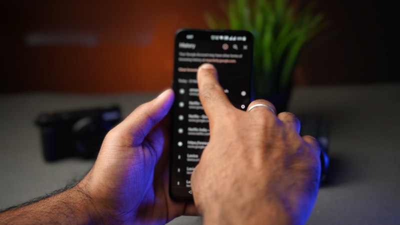 A Person Is Scrolling Through Their Mobile Browsing History on A Smartphone Screen